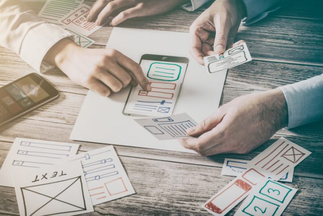 designer-drawing-website-ux-app-development